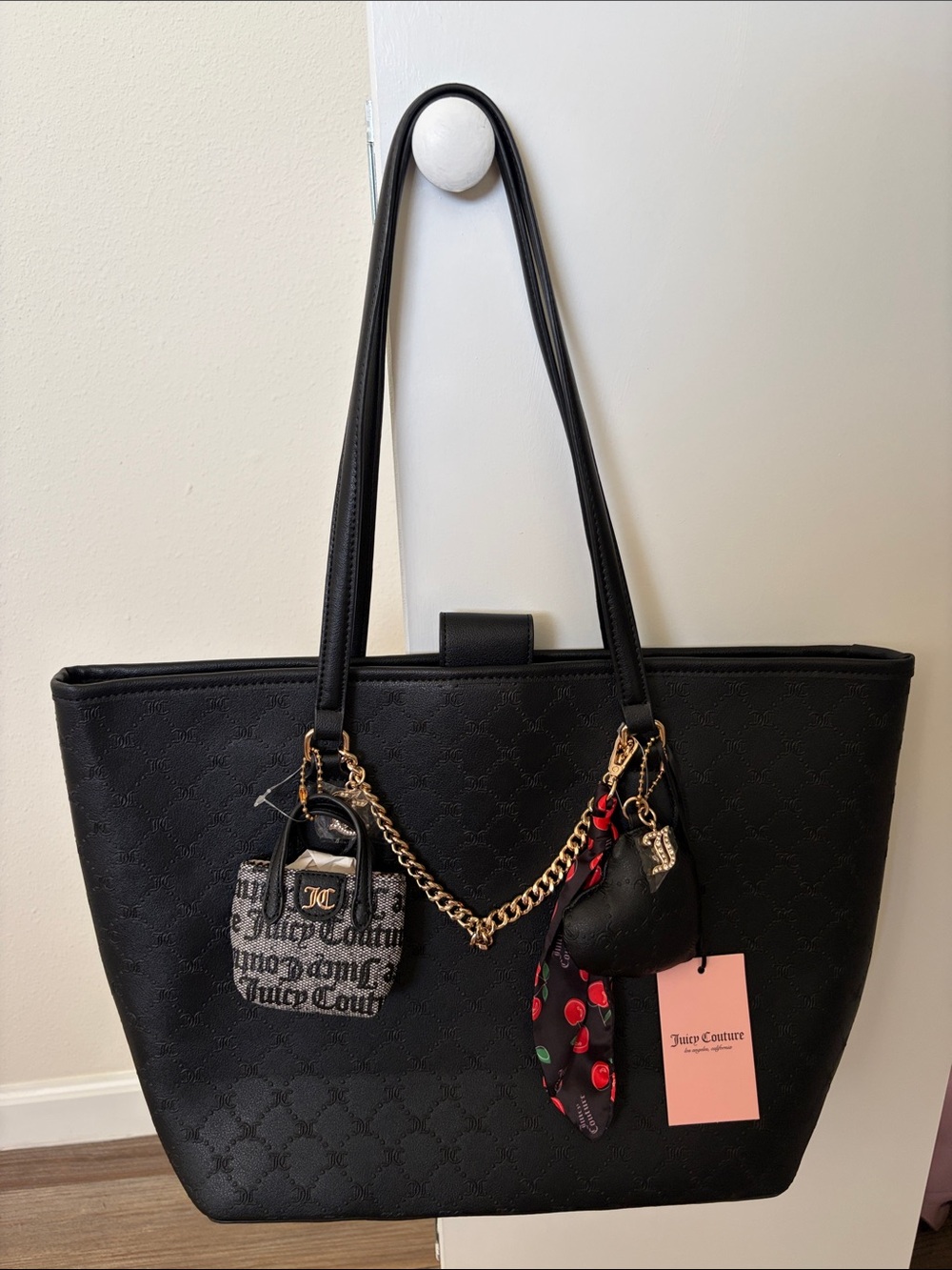 Juicy Couture Black Tote with Gold Chain and Charm Accents